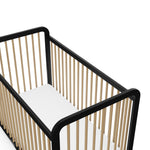 close up view of Black with driftwood crib