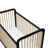 close up view of Black with driftwood crib