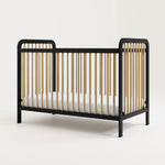 angle view of black with driftwood crib