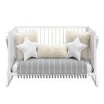 White crib in daybed conversion