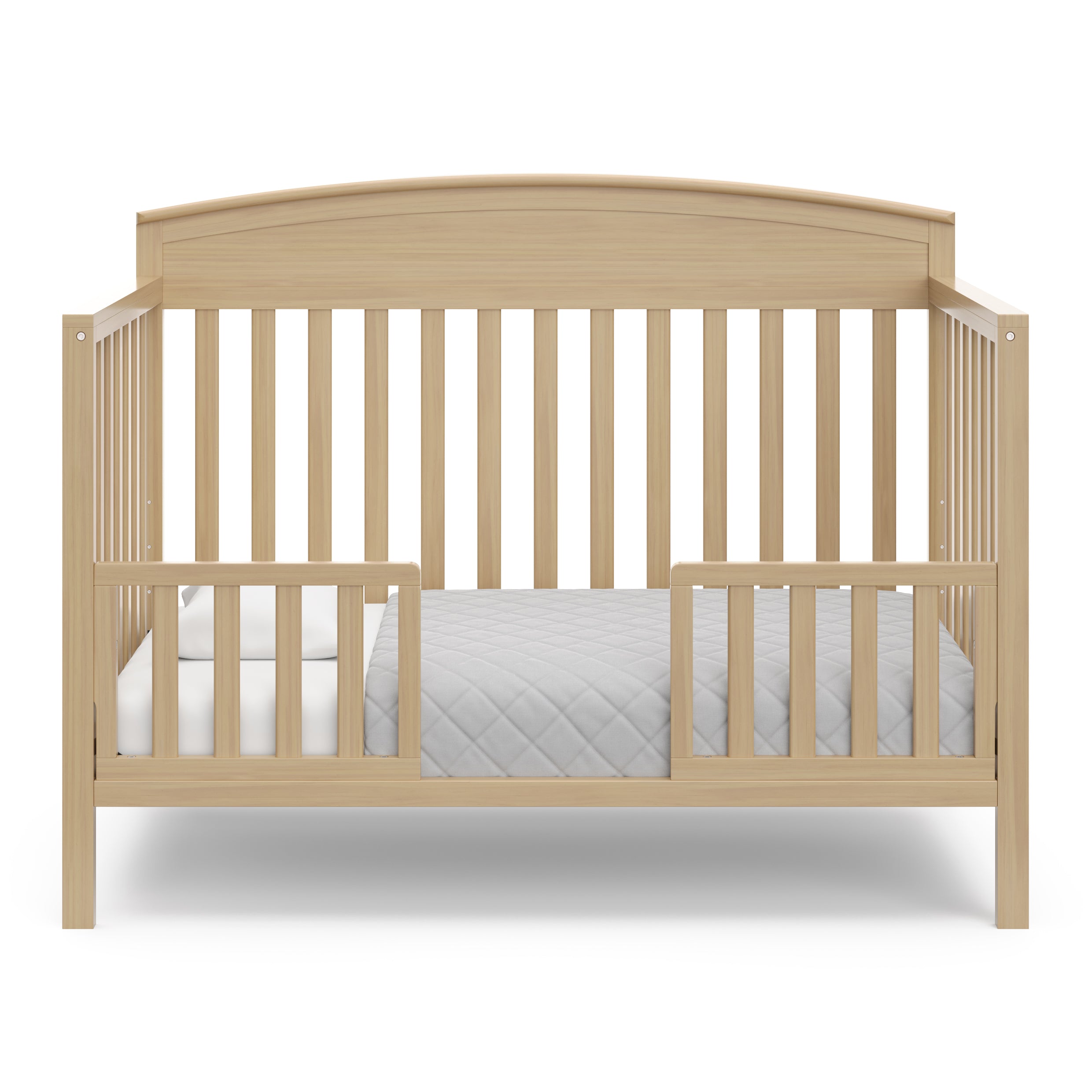 Benton driftwood crib converted to toddler bed with two guardrails
