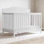 White crib in nursery