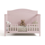 Paris blush crib converted to toddler bed with two guardrails