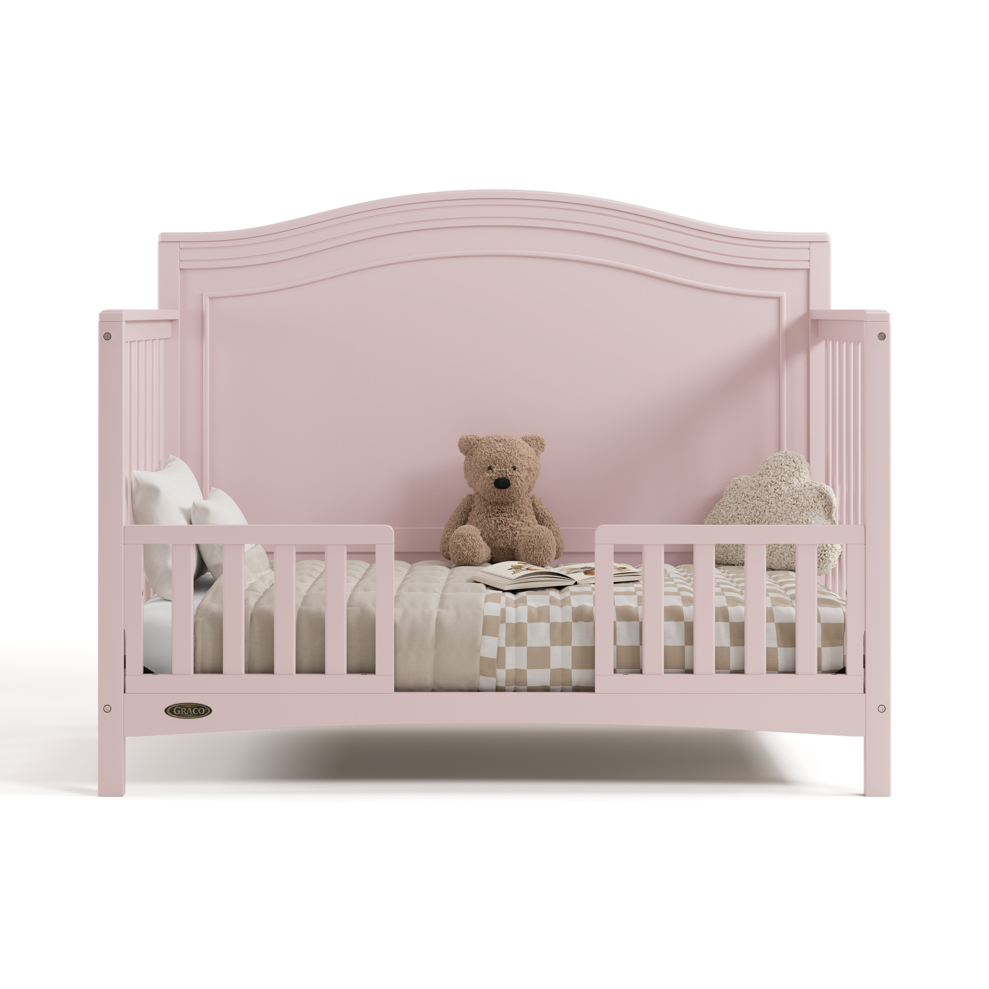 Paris blush crib converted to toddler bed with two guardrails