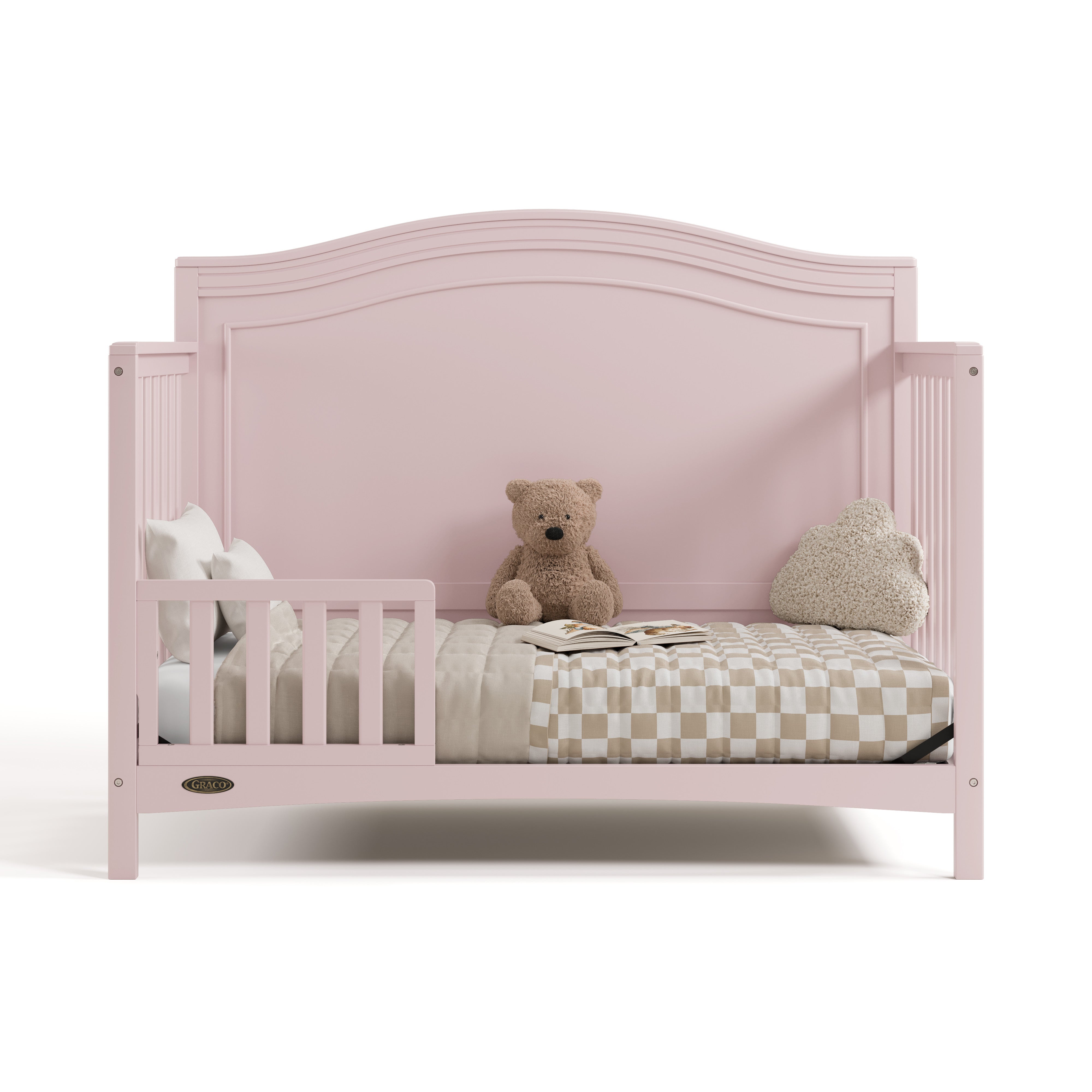 Paris blush crib converted to toddler bed with one guardrail