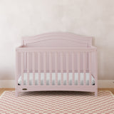 Paris blush crib in a nursery
