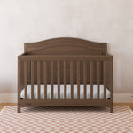 Paris hazelnut crib in a nursery