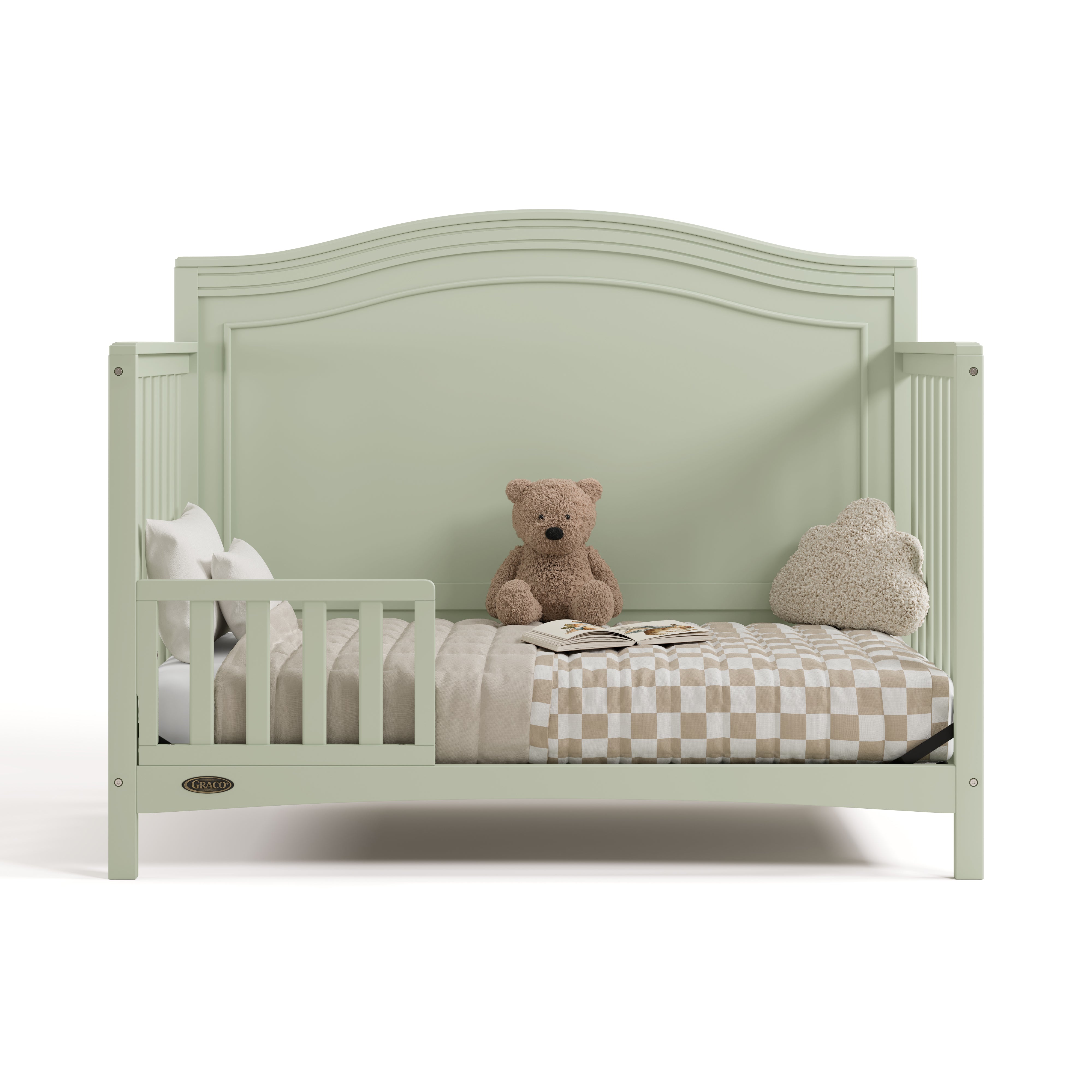 Paris sage crib converted to toddler bed with one guardrail
