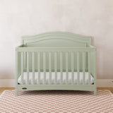 Paris sage crib in a nursery