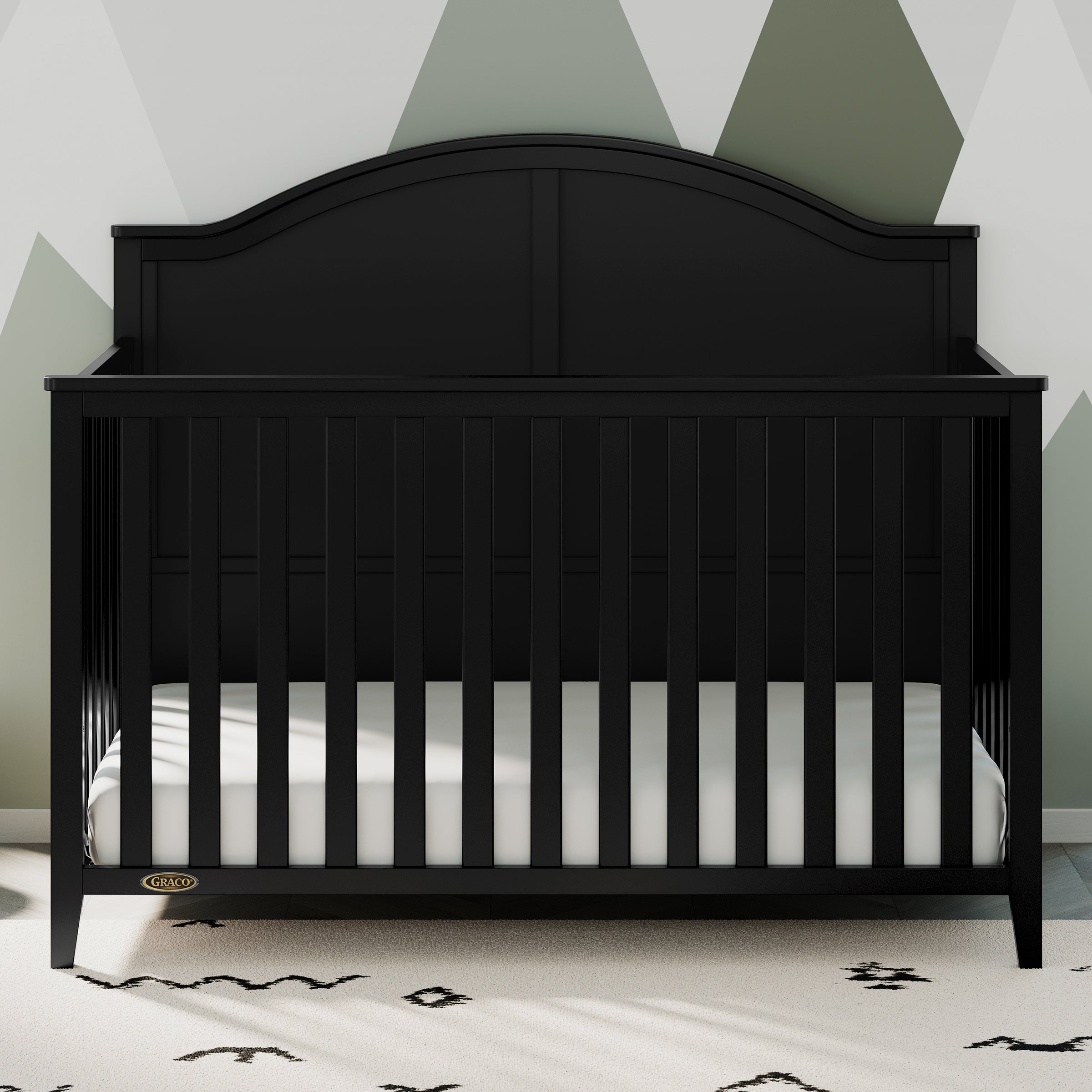 black crib in nursery