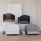 four white, espresso, black and pebble gray cribs in nursery