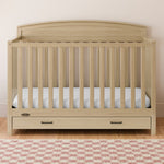 Benton driftwood crib with drawer in a nursery