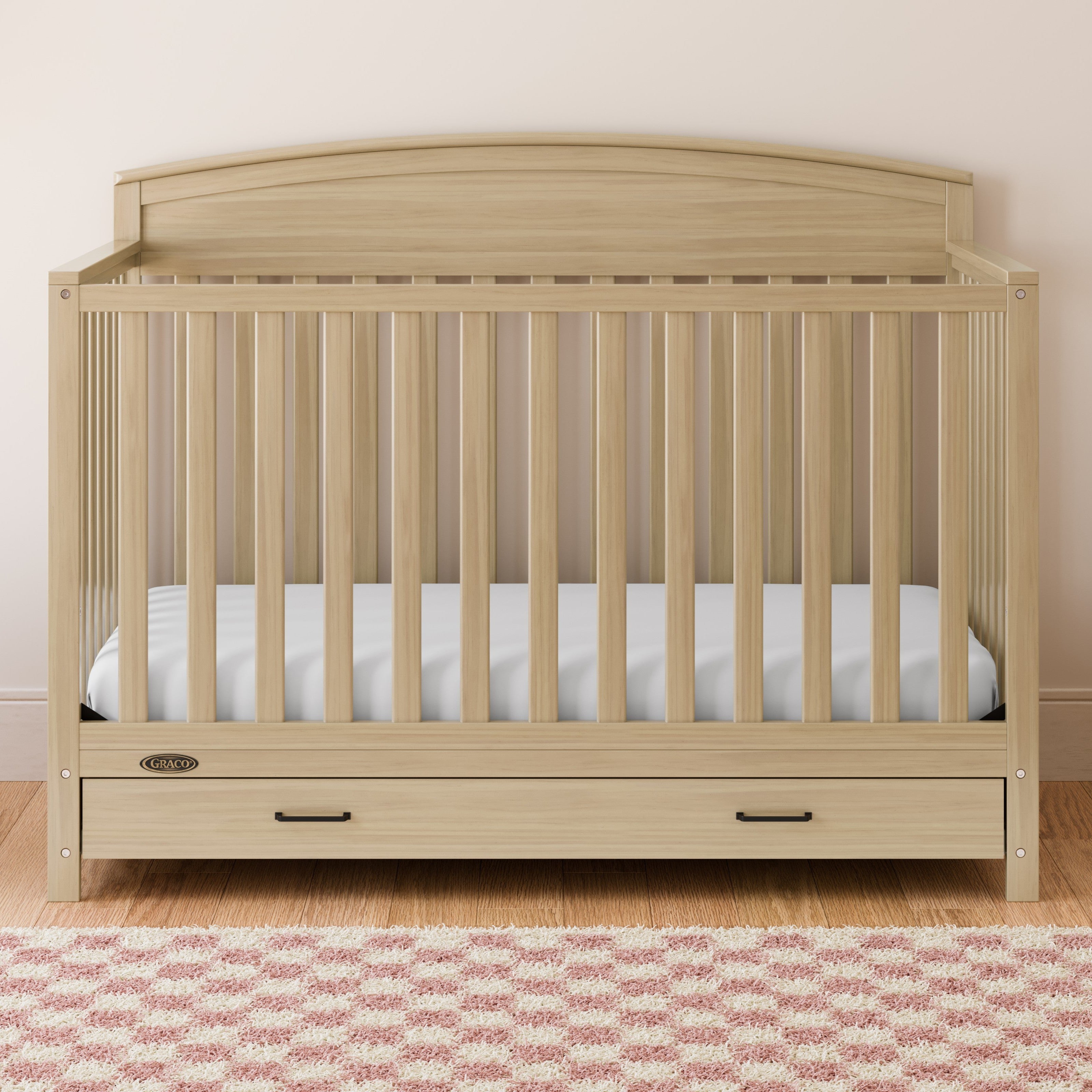 Benton driftwood crib with drawer in a nursery