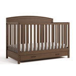 Benton hazelnut crib with drawer angle view