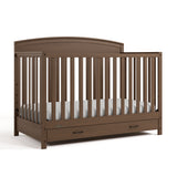 Benton hazelnut crib with drawer angle view