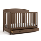 Benton hazelnut crib with drawer open angle view