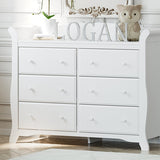 White 6 drawer dresser in nursery