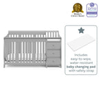 Pebble gray crib with changer changing pad graphic