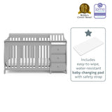 Pebble gray crib with changer changing pad graphic