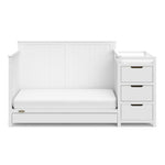 White crib and changer with drawer in toddler bed conversion
