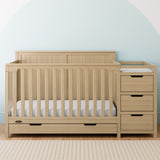 Hadley driftwood crib and changer with drawer in a nursery
