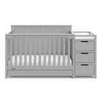 Front view of Pebble gray crib with drawer and changer with drawer