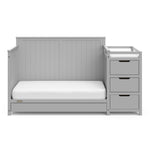 Pebble gray crib and changer with drawer in toddler bed conversion