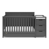 Front view of gray crib with drawer and changer with drawer