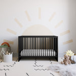 black crib in nursery