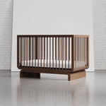 santorini crib hazelnut in studio