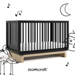Santorini black with driftwood crib with black cartoon drawings