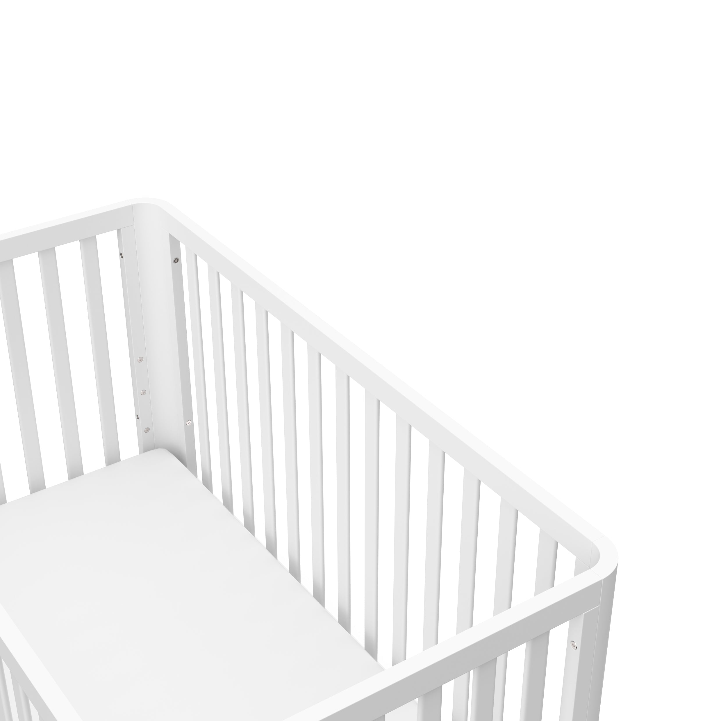 top view of a white crib with a natural wood color base