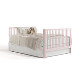 Casablanca blush crib with drawer converted to full-size bed with footboard