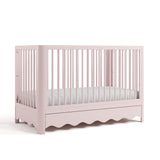 Casablanca blush crib with drawer angle view