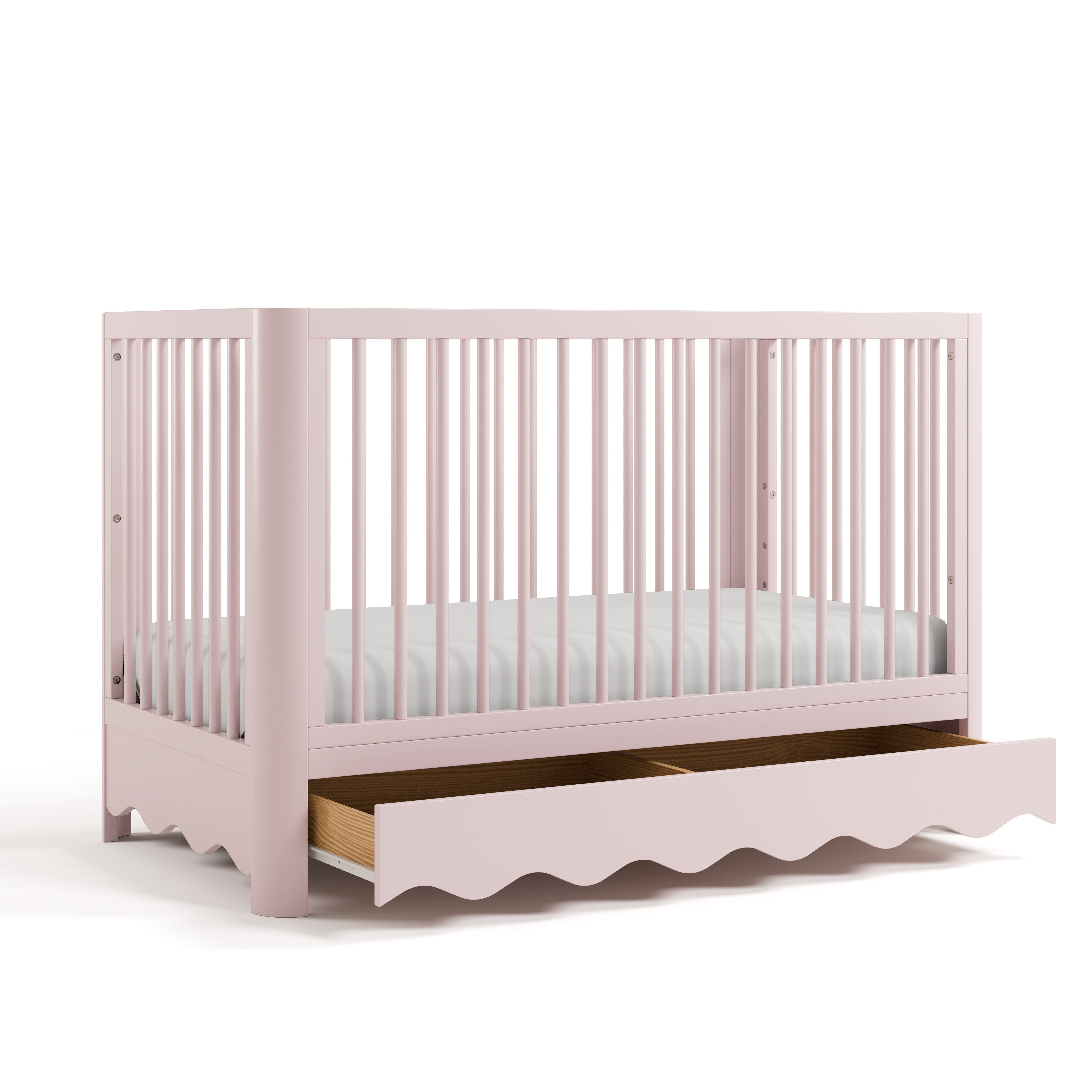 Casablanca blush crib with drawer open angle view
