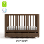 Caablanca hazelnut crib with GGG and PTPA logo on top left