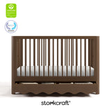 Caablanca hazelnut crib with GGG and PTPA logo on top left