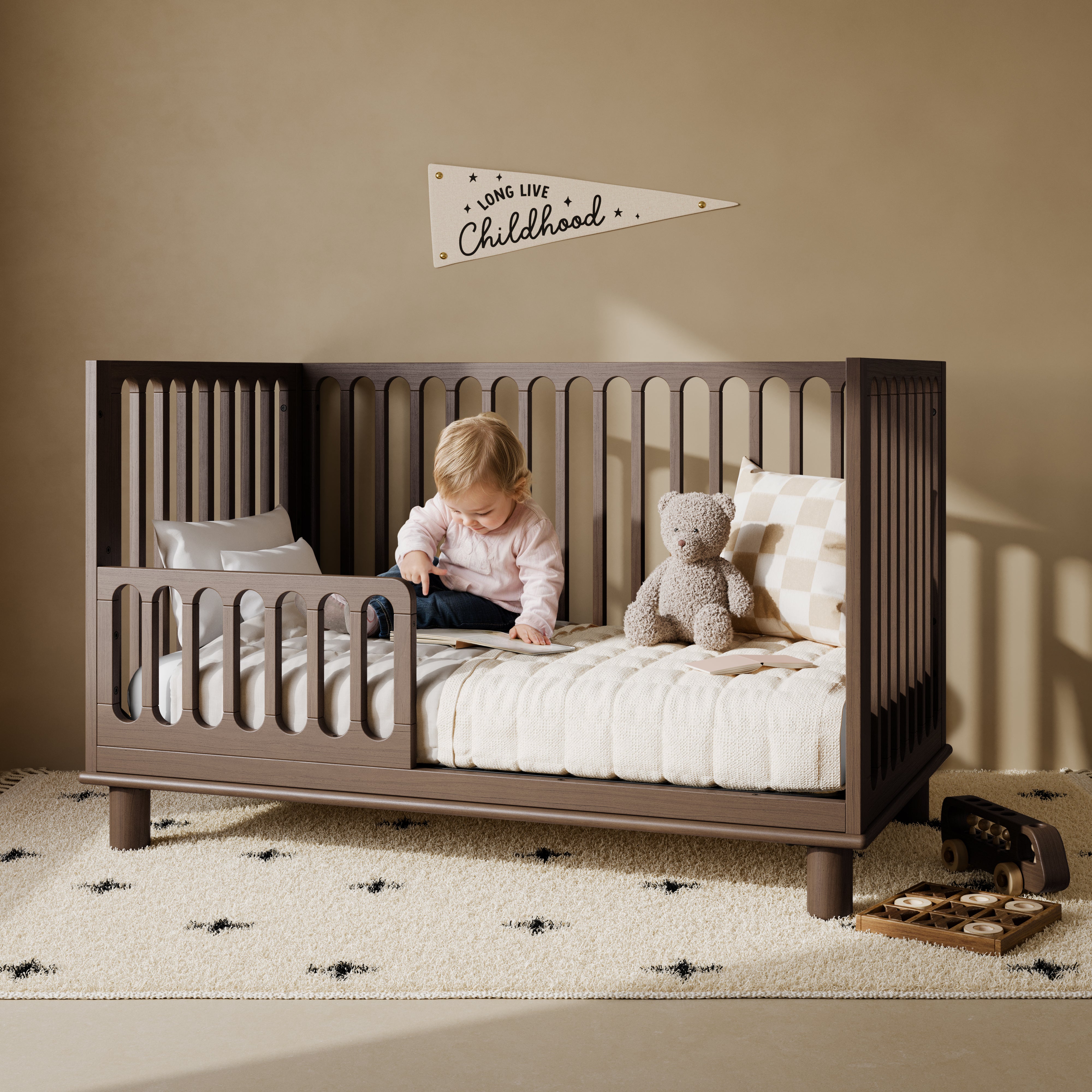 Sicily hazelnut crib converted to toddler bed in kids room