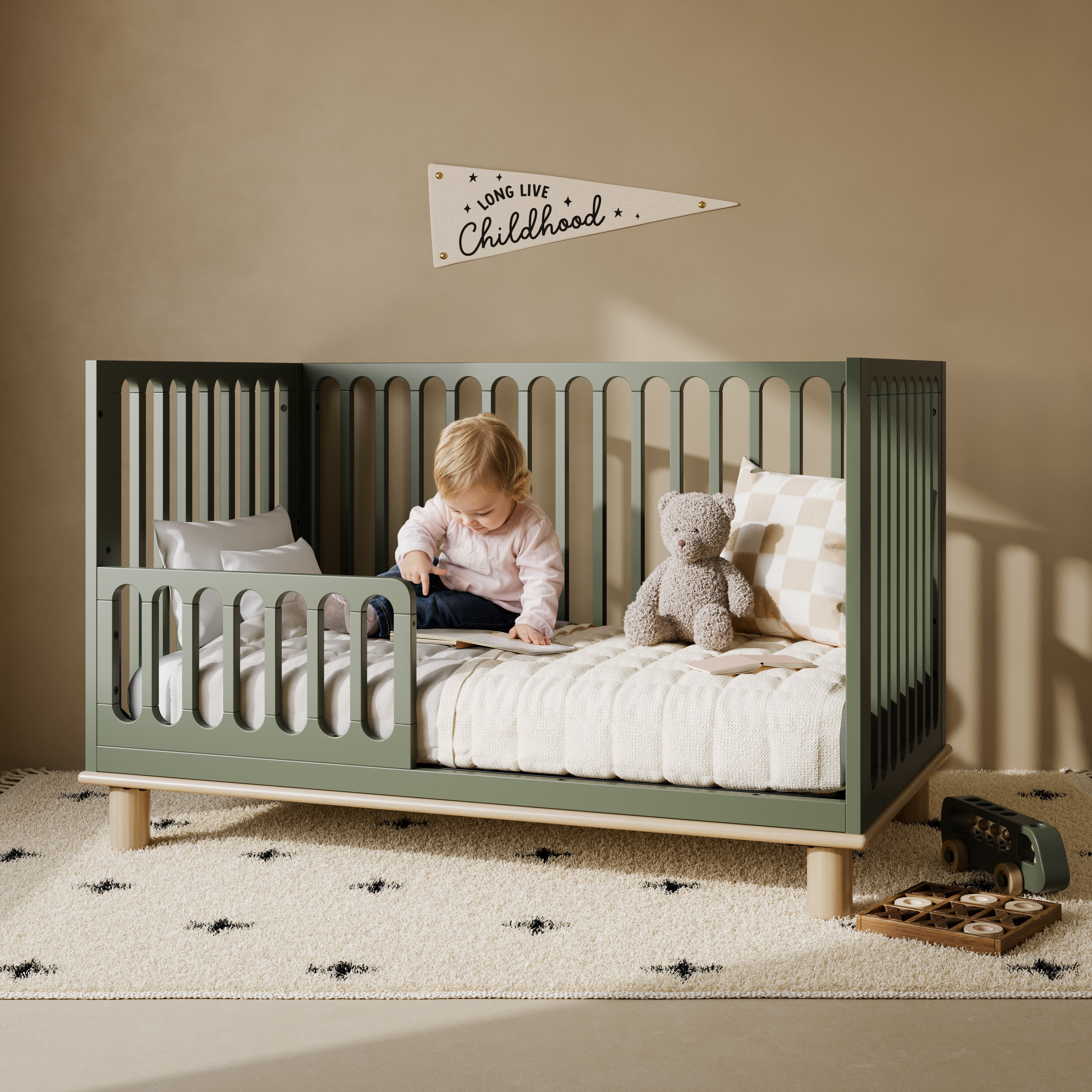 Sicily olive with driftwood crib converted to toddler bed in kids room