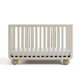 Amalfi frosted oat with driftwood crib front view