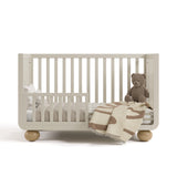 Amalfi frosted oat with driftwood crib converted to toddler bed