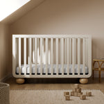 Amalfi frosted oat with driftwood crib in a nursery