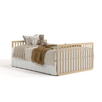 Amalfi driftwood crib converted to full-size bed with footboard
