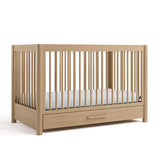 Malta driftwood crib with drawer angle view