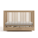 Malta driftwood crib with drawer front view
