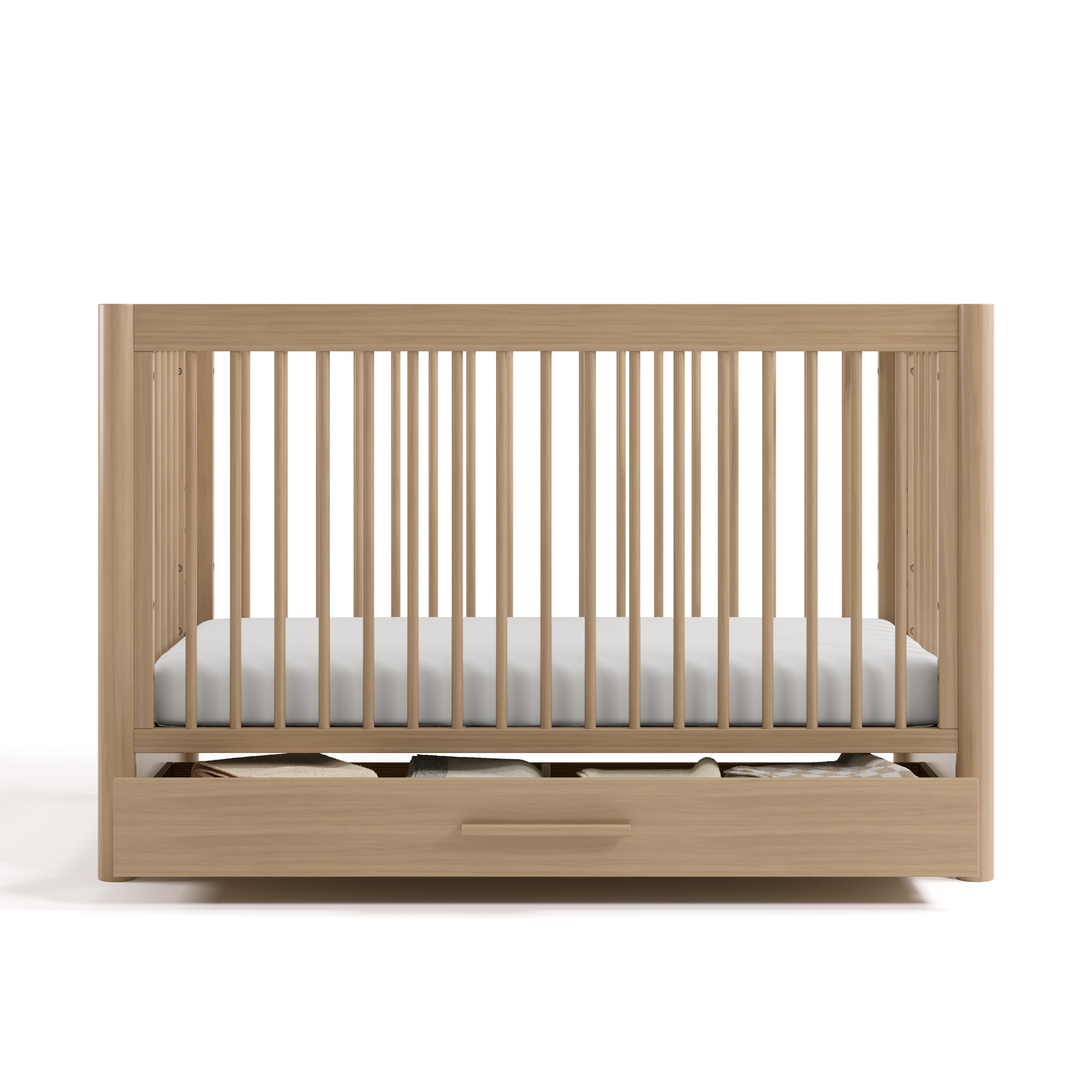 Malta driftwood crib with drawer front view