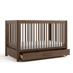 Malta hazelnut crib with drawer open angle view