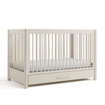 Malta frosted oat crib with drawer angle view