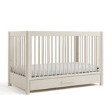 Malta frosted oat crib with drawer angle view