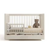 Malta frosted oat crib with drawer converted to toddler bed